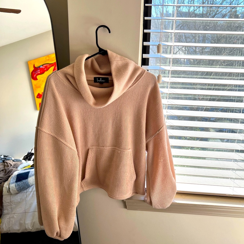 Brand: Lulu’s. Cropped cow neck sweater with pocket.